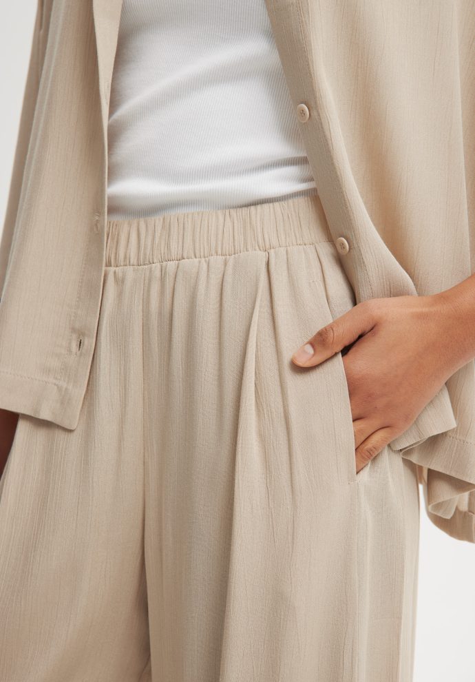 spodnie zora piaskowe